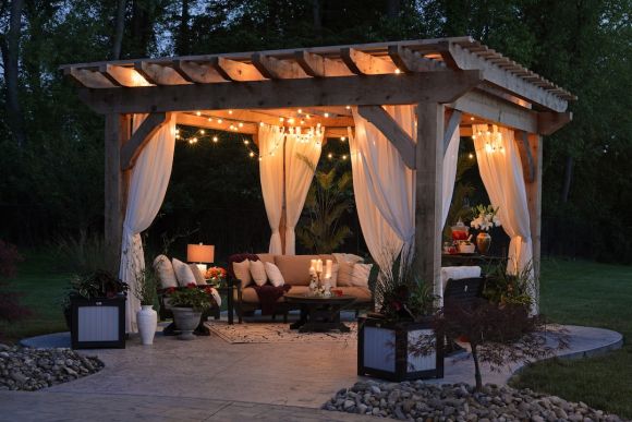 Patio - photo of gazebo with curtain and string lights